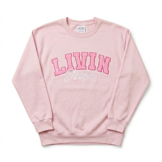 Pink crewneck on white background